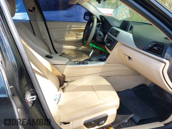 2014 BMW 3 Series 320i with VIN WBA3B1C56EK131849, listed as a IAAI auction lot 42018005 with 215,765 mi miles. Bid and sale history available at carsss.com. Image 5.