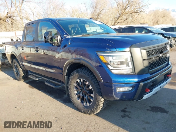 2021 Nissan Titan Pro-4X z VIN 1N6AA1ED1MN517476, wystawiony jako IAAI lot #41422217 z przebiegiem 62 650 mil mil oraz . Historia ofert i sprzedaży dostępna na DreamBid. Obrazek 1.