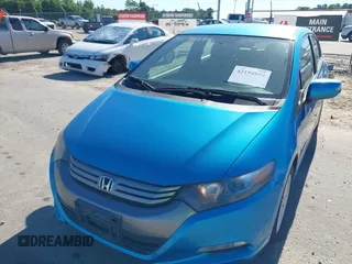 2010 Honda Insight EX with VIN JHMZE2H74AS013148, listed as a IAAI auction lot 42194894 with 114,885 mi miles and . Bid and sale history available at DreamBid. Image 17.