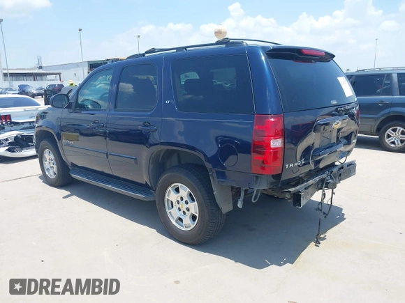 2007 Chevrolet Tahoe LT with VIN 1GNFC13017R374293, listed as a IAAI auction lot 42435427 with 75,212 mi miles and . Bid and sale history available at DreamBid. Image 3.