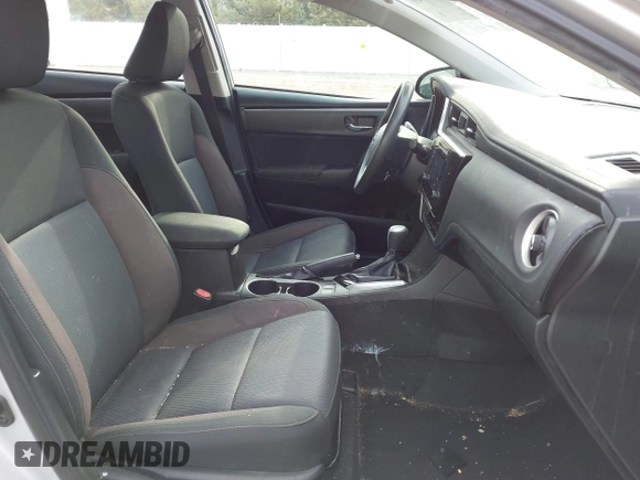 2019 Toyota Corolla L with VIN 5YFBURHE2KP934042, listed as a IAAI auction lot 41963491 with 87,299 mi miles. Bid and sale history available at carsss.com. Image 5.