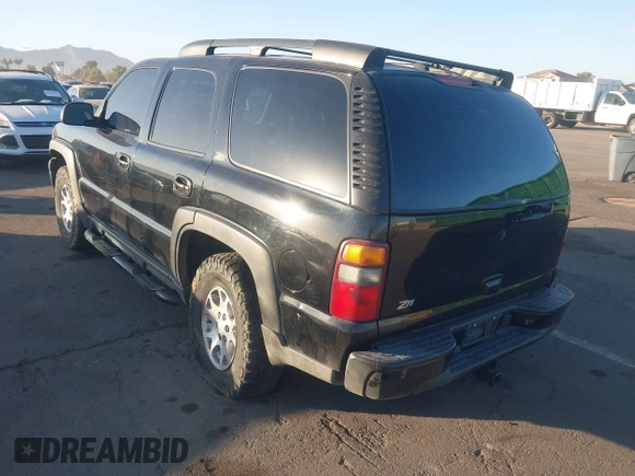 2002 Chevrolet Tahoe Z71 with VIN 1GNEK13T72R259229, listed as a IAAI auction lot 41074268 with 24,206 mi miles. Bid and sale history available at carsss.com. Image 3.