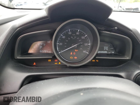 2018 Mazda CX-3 Sport z VIN JM1DKFB79J1323497, wystawiony jako Copart lot #56168875 z przebiegiem 60 284 mil mil oraz Szkoda całkowita • Salvage title. Historia ofert i sprzedaży dostępna na DreamBid. Obrazek 9.