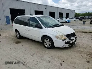 2005 Dodge Caravan SXT z VIN 2D4GP44L15R380469, wystawiony jako Copart lot #58800775 z przebiegiem Nie podano mil oraz Szkoda całkowita • Salvage title. Historia ofert i sprzedaży dostępna na DreamBid. Obrazek 14.