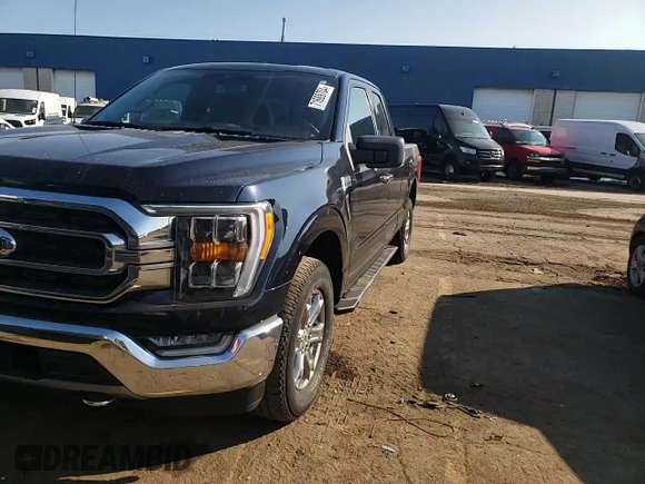 2021 Ford F-150 XL with VIN 1FTFX1E88MKD05444, listed as a Copart auction lot 71669704 with 35,779 mi miles and Salvage title. Bid and sale history available at DreamBid. Image 11.