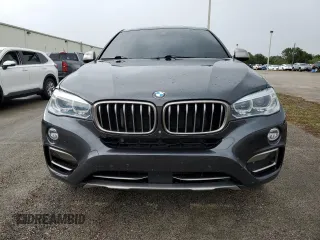 2018 BMW X6 xDrive50i with VIN 5UXKU6C5XJ0W39056, listed as a Copart auction lot 75116634 with 90,043 mi miles and Salvage Title. Bid and sale history available at carsss.com. Image 5.