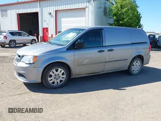 2014 Ram Cargo Van with VIN 2C4RRGAG9ER312915, listed as a IAAI auction lot 41947886 with 149,144 mi miles and . Bid and sale history available at DreamBid. Image 2.