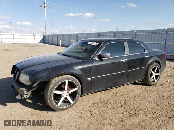 2006 Chrysler 300 C with VIN 2C3KA63H06H272552, listed as a Copart auction lot 72185684 with 105,737 mi miles and Salvage Title. Bid and sale history available at carsss.com. Image 1.