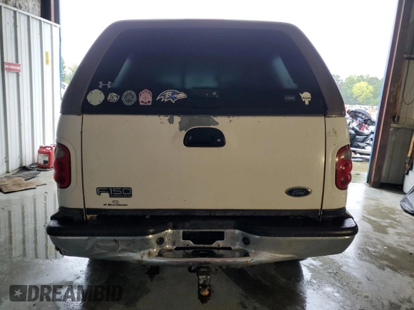 2002 Ford F-150 XLT with VIN 1FTRW08692KE20555, listed as a Copart auction lot 73571414 with 166,288 mi miles and Clean Title. Bid and sale history available at carsss.com. Image 6.