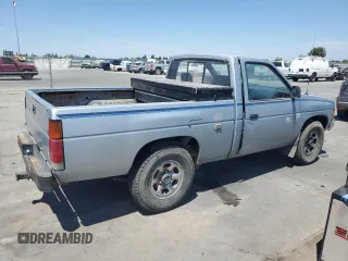 1987 Nissan Hardbody E z VIN JN6ND11S1HW030629, wystawiony jako Copart lot #65657004 z przebiegiem 181 228 mil mil oraz Szkody całkowita. Historia ofert i sprzedaży dostępna na DreamBid. Obrazek 3.