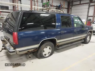 1999 Chevrolet Suburban z VIN 1GNFK16R1XJ409829, wystawiony jako IAAI lot #42045240 z przebiegiem 337 554 mil mil oraz . Historia ofert i sprzedaży dostępna na DreamBid. Obrazek 4.