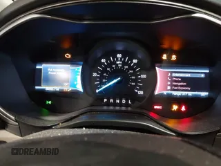 2019 Ford Fusion Hybrid SEL with VIN 3FA6P0MU8KR272811, listed as a IAAI auction lot 41705282 with 56,565 mi miles. Bid and sale history available at carsss.com. Image 7.