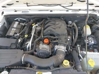 2013 Jeep Wrangler Unlimited Sport with VIN 1C4BJWDGXDL694054, listed as a IAAI auction lot 42097708 with 130,360 mi miles and . Bid and sale history available at DreamBid. Image 10.