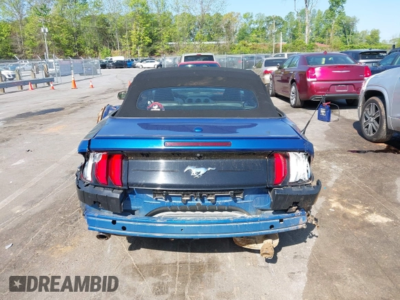2022 Ford Mustang EcoBoost z VIN 1FATP8UH4N5102828, wystawiony jako IAAI lot #42073571 z przebiegiem 69 931 mil mil oraz . Historia ofert i sprzedaży dostępna na DreamBid. Obrazek 16.
