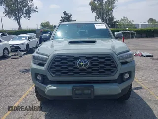 2022 Toyota Tacoma SR5 with VIN 3TMBZ5DN1NM035572, listed as a IAAI auction lot 42083925 with 82,596 mi miles and . Bid and sale history available at DreamBid. Image 13.