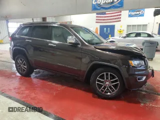 2017 Jeep Grand Cherokee Limited with VIN 1C4RJFBG1HC641024, listed as a Copart auction lot 52885535 with 106,044 mi miles and Salvage Title. Bid and sale history available at carsss.com. Image 4.
