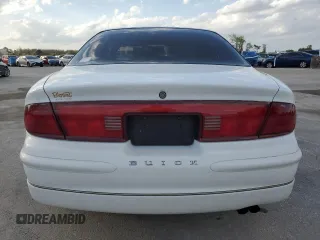 1997 Buick Regal LS with VIN 2G4WB52K4V1411196, listed as a Copart auction lot 47542305 with 100,521 mi miles and Salvage Title. Bid and sale history available at carsss.com. Image 6.