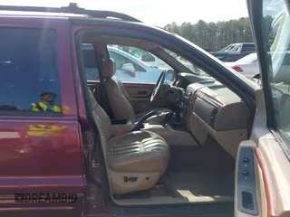 1999 Jeep Grand Cherokee Limited with VIN 1J4GW68N8XC595697, listed as a IAAI auction lot 41917466 with 177,944 mi miles. Bid and sale history available at carsss.com. Image 5.