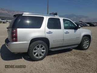 2014 GMC Yukon Denali with VIN 1GKS2EEF8ER140799, listed as a Copart auction lot 69584934 with 79,670 mi miles and Salvage Title. Bid and sale history available at carsss.com. Image 3.
