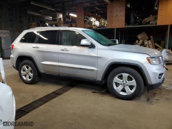 2011 Jeep Grand Cherokee Laredo with VIN 1J4RR4GG0BC583821, listed as a Copart auction lot 59176674 with 198,027 mi miles and Salvage Title. Bid and sale history available at carsss.com. Image 4.