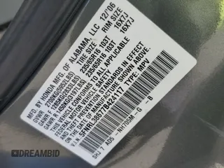 2007 Honda Odyssey EX-L z VIN 5FNRL38677B424117, wystawiony jako Copart lot #58814235 z przebiegiem 188 908 mil mil oraz Szkoda całkowita • Salvage title. Historia ofert i sprzedaży dostępna na DreamBid. Obrazek 13.