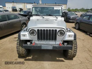 2002 Jeep Wrangler X с VIN 1J4FA39S52P770423, выставлен на аукционе Copart как лот 62498885 с пробегом 87 433 миль миль и Чистый • Clean title. История ставок и продаж доступна на DreamBid. Изображение 5.