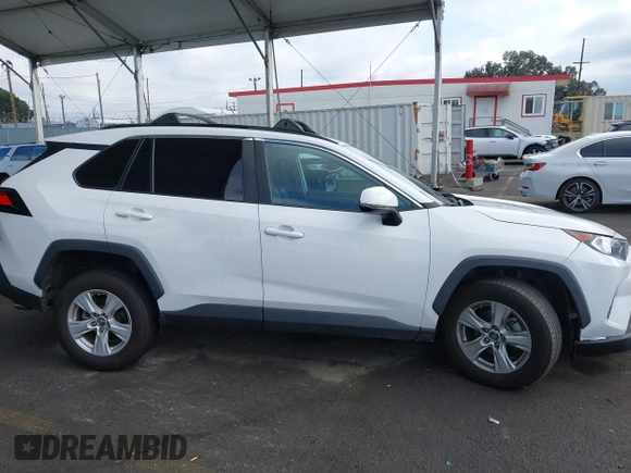 2019 Toyota RAV4 XLE with VIN 2T3W1RFV5KW051023, listed as a IAAI auction lot 40970612 with 106,359 mi miles and . Bid and sale history available at DreamBid. Image 12.