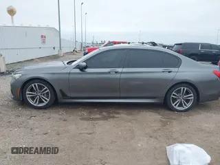 2016 BMW 7 Series 740i with VIN WBA7E2C56GG546920, listed as a IAAI auction lot 41610698 with 119,689 mi miles. Bid and sale history available at carsss.com. Image 14.