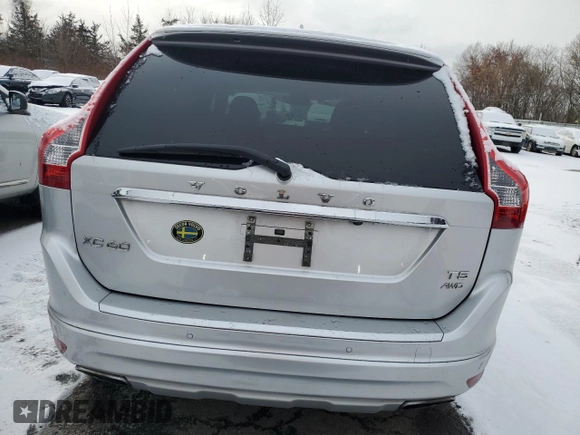 2016 Volvo XC60 T5 Premier with VIN YV4612RK5G2825535, listed as a Copart auction lot 84975144 with 74,677 mi miles and Salvage Title. Bid and sale history available at carsss.com. Image 6.
