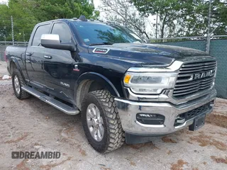 2022 Ram 2500 Laramie z VIN 3C6UR5FL7NG282895, wystawiony jako IAAI lot #41902088 z przebiegiem 50 490 mil mil oraz . Historia ofert i sprzedaży dostępna na DreamBid. Obrazek 1.