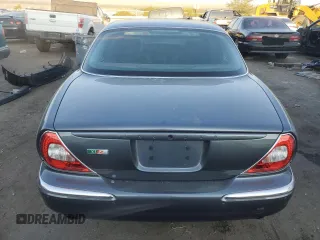 2004 Jaguar XJ with VIN SAJWA73B64TG30921, listed as a Copart auction lot 71267074 with 20,031 mi miles and Salvage Title. Bid and sale history available at carsss.com. Image 6.