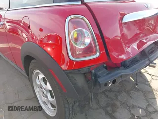 2012 MINI Hardtop with VIN WMWSU3C55CT541177, listed as a IAAI auction lot 41608998 with 123,930 mi miles and . Bid and sale history available at DreamBid. Image 13.