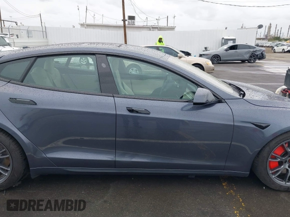 2022 Tesla Model S with VIN 5YJSA1E52NF459460, listed as a IAAI auction lot 41736236 with Not Provided miles and . Bid and sale history available at DreamBid. Image 13.