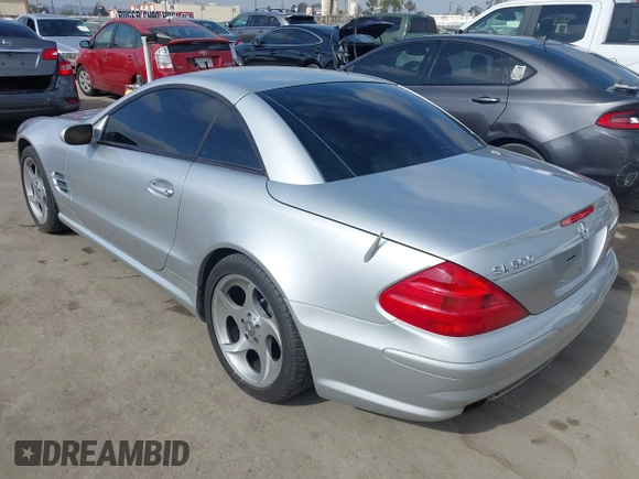 2004 Mercedes-Benz SL 500 with VIN WDBSK75F44F071115, listed as a IAAI auction lot 42565805 with 80,201 mi miles and . Bid and sale history available at DreamBid. Image 3.