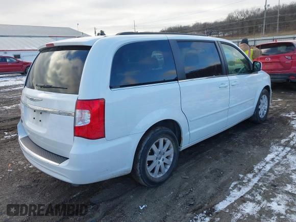2015 Chrysler Town & Country LX with VIN 2C4RC1AG0FR676463, listed as a IAAI auction lot 41269495 with 83,020 mi miles and . Bid and sale history available at carsss.com. Image 4.
