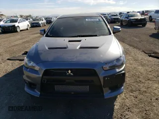 2015 Mitsubishi Lancer Evolution Final Edition z VIN JA32W7FV5FU028542, wystawiony jako Copart lot #67491522 z przebiegiem 83 173 mil mil oraz . Historia ofert i sprzedaży dostępna na DreamBid. Obrazek 5.