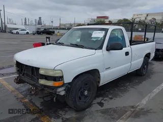 2002 Chevrolet Silverado 1500 Work Truck with VIN 1GCEC14V72E241181, listed as a IAAI auction lot 42125039 with 149,702 mi miles. Bid and sale history available at carsss.com. Image 2.