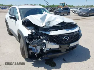 2024 Mazda CX-50 S Select с VIN 7MMVABAM9RN238736, выставлен на аукционе IAAI как лот 42003658 с пробегом 9 880 миль миль и . История ставок и продаж доступна на DreamBid. Изображение 6.