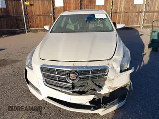 2014 Cadillac CTS Luxury AWD z VIN 1G6AX5SX3E0149360, wystawiony jako IAAI lot #41020479 z przebiegiem 98 917 mil mil oraz . Historia ofert i sprzedaży dostępna na DreamBid. Obrazek 11.