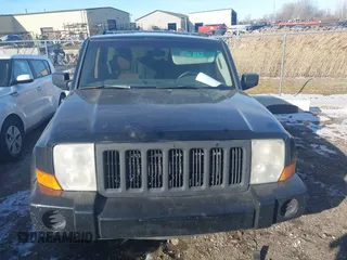 2007 Jeep Commander Sport z VIN 1J8HG48K37C647814, wystawiony jako IAAI lot #41428248 z przebiegiem 224 137 mil mil oraz . Historia ofert i sprzedaży dostępna na DreamBid. Obrazek 12.
