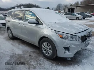 2017 Kia Sedona LX with VIN KNDMB5C10H6301180, listed as a IAAI auction lot 41027876 with 113,528 mi miles. Bid and sale history available at carsss.com. Image 1.
