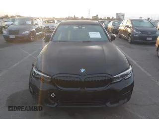 2021 BMW 3 Series 330i with VIN 3MW5R1J02M8B95303, listed as a IAAI auction lot 42184843 with 55,928 mi miles and . Bid and sale history available at carsss.com. Image 13.