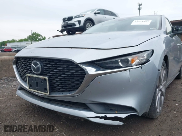2020 Mazda 3 Select with VIN 3MZBPACL0LM131878, listed as a IAAI auction lot 42274393 with 105,656 mi miles and . Bid and sale history available at DreamBid. Image 6.