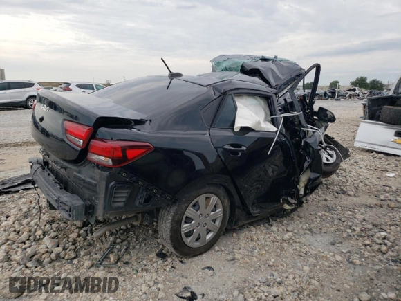 2023 Kia Rio S with VIN 3KPA24AD4PE586940, listed as a Copart auction lot 67748104 with Not Provided miles and Salvage Title. Bid and sale history available at DreamBid. Image 3.