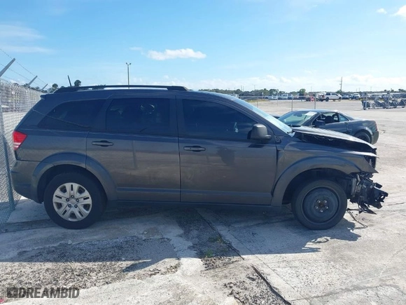 2019 Dodge Journey SE Value Pkg with VIN 3C4PDCAB7KT747315, listed as a IAAI auction lot 41028740 with 143,469 mi miles. Bid and sale history available at carsss.com. Image 13.