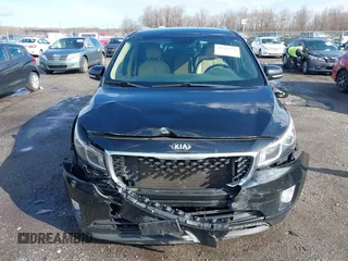 2017 Kia Sedona EX with VIN KNDMC5C18H6260441, listed as a IAAI auction lot 41797159 with 77,309 mi miles. Bid and sale history available at carsss.com. Image 12.