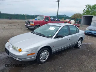 2002 Saturn SL z VIN 1G8ZK52762Z131497, wystawiony jako IAAI lot #42086108 z przebiegiem 119 273 mil mil oraz . Historia ofert i sprzedaży dostępna na DreamBid. Obrazek 17.