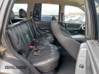 2003 Jeep Grand Cherokee Laredo with VIN 1J4GW48SX3C569087, listed as a Copart auction lot 55941035 with Not provided miles and Salvage title. Bid and sale history available at DreamBid. Image 11.