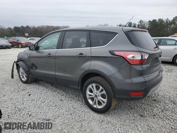2017 Ford Escape SE with VIN 1FMCU0GD5HUC67421, listed as a Copart auction lot 86633734 with 82,929 mi miles and Salvage Title. Bid and sale history available at DreamBid. Image 2.
