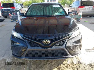 2023 Toyota Camry SE z VIN 4T1G11AKXPU747251, wystawiony jako IAAI lot #42388819 z przebiegiem 39 542 mil mil oraz . Historia ofert i sprzedaży dostępna na DreamBid. Obrazek 12.